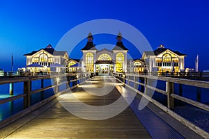 Pier in the seaside resort of Sellin on RÃ¼gen island at Baltic Sea during blue hour in Germany