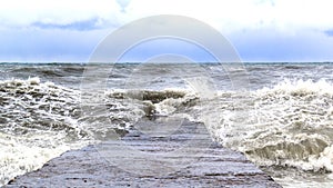 A pier during a storm on the Black Sea.