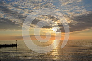 pier at sunset in new quay