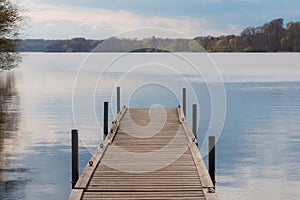 Pier to Danish lake Farum Lake - autum season