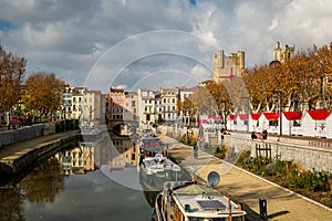 Pier with touristic boats in City of Narbonne, France.
