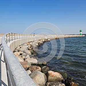 Pier of Travemuende Luebeck with lighthouse