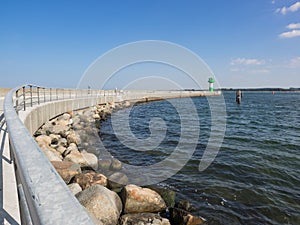 Pier of Travemuende Luebeck with lighthouse