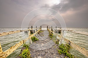 Pier in water of lake IJsselmeer