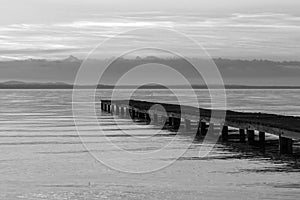 Pier and water reflections