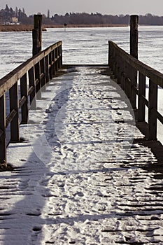 Pier in Winter on frozen Havel river