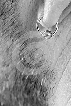 Pierced ear of a man