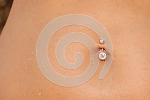 Piercing in a navel photo
