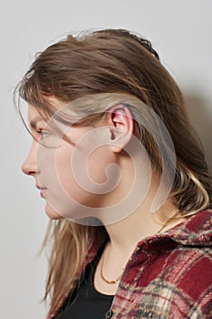 piercings on an ear. Conch and helix piercings close up.