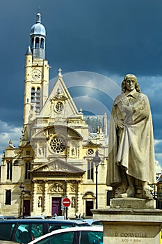 Pierre Corneille statue and Saint tienne du Mont church . Paris, France