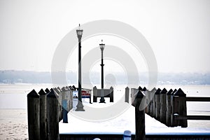 Piers on Lake Geneva, Wisconsin in Winter photo