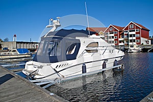 On the piers in the port of Halden (cabin cruiser) photo