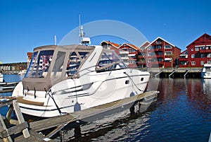 On the piers in the port of Halden (cabin cruiser) photo