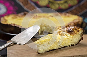 Pies of cheese and sliced.