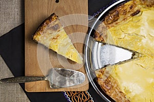 Pies of cheese and sliced.