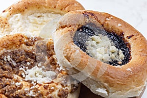 pies stuffed with poppy, curd and nuts filling