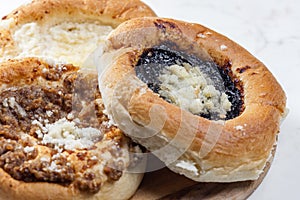 pies stuffed with poppy, curd and nuts filling