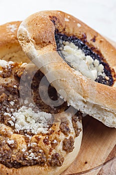 pies stuffed with poppy, curd and nuts filling