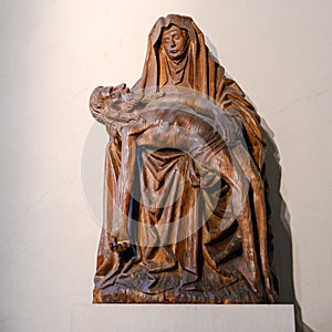 Pieta, wooden sculpture in Ulm Minster, Ulm Cathedral. Ulmer Muenster, Baden-Wuerttemberg, Germany photo