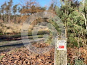 Pieterpad sign at the Holterberg during autumn