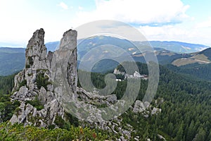 Pietrele Doamnei from Rarau mountains with Rarau hotel, Romania.