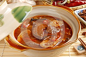 The pig's intestines & blood with hot sauce