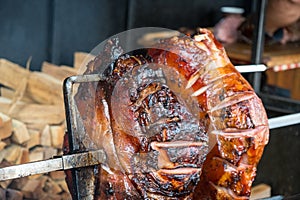 The pig`s leg on the grill, roast, Prague