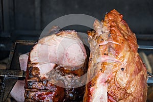 The pig`s leg on the grill, roast, Prague