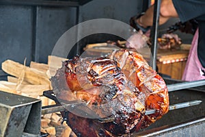 The pig`s leg on the grill, roast, Prague