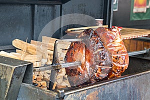 The pig`s leg on the grill, roast, Prague