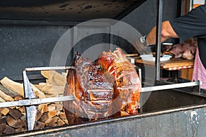 The pig`s leg on the grill, roast, Prague