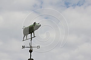 Pig weathervane in the sky