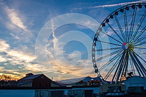 Pigeon Forge, Tennessee - December 3, 2017 :  The Great Smoky Mountain Wheel as seen from The Island at sunset