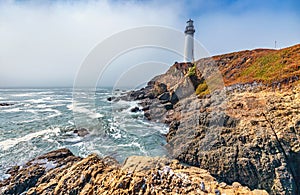 Pigeon Point lighthouse against the backdrop of a beautiful sky and ocean with waves, a great landscape of the Pacific coast in