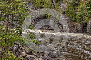 The Pigeon River flows through Grand Portage State Park and Indian Reservation. It is the Border between Ontario and Minnesota