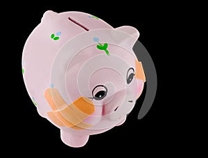 Piggy Bank with Bandages photo