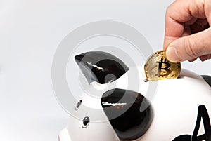 Piggy bank and bitcoin concept coin investment for retirement pension or savings concept