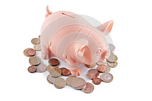 Piggy bank and coins