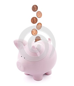 Piggy bank with coins