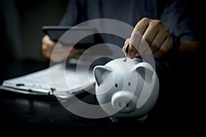 piggy bank with coins and currency, concept of saving money.Business financial planning, investment, budgeting, and money