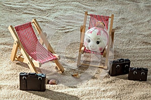 Piggy bank in a deck chair