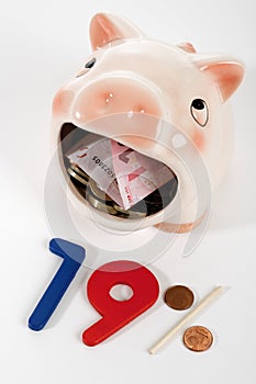 Piggy bank eating money