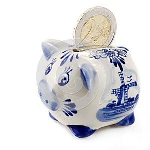 Piggy bank with euro coin