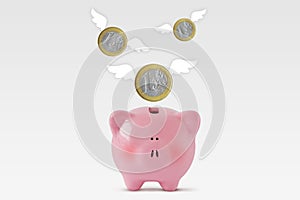 Piggy bank with euro coins flying away - Concept of economy and loss of money