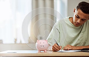 Piggy bank, finance and man with budget, writing and savings with bills, planning and future at home. Money management