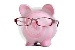 Piggy bank, glasses, old age, wisdom, retirement saving concept