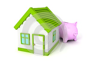 Piggy Bank with green roof house on white