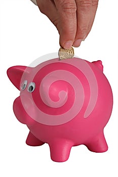 Piggy Bank and Hand with Coin