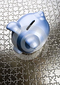 Piggy bank on jigsaws