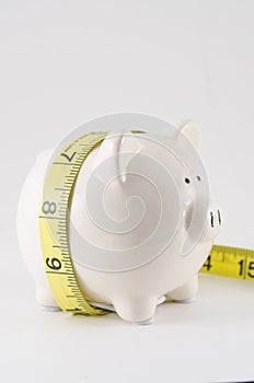 Piggy bank with measure tape